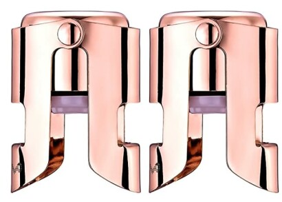 Various champagne bottles with a stylish stopper.
