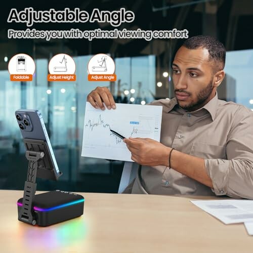 Man demonstrating adjustable phone stand with chart