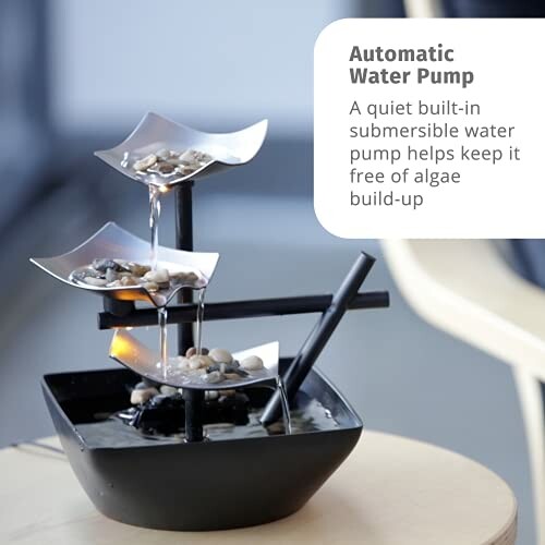 Modern tiered water fountain with automatic pump, featuring a sleek design and stones.
