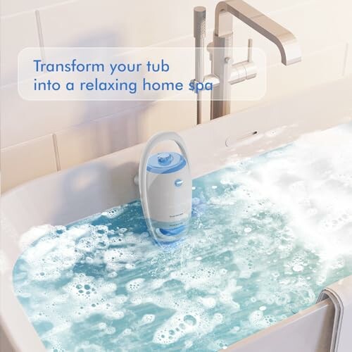 Bathtub with a spa device creating bubbles.