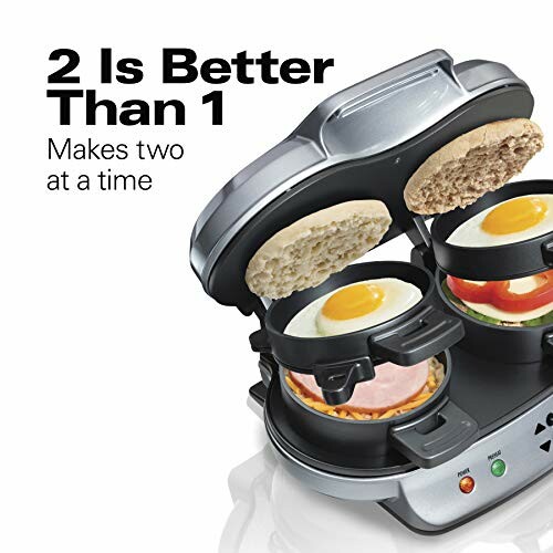 Dual breakfast sandwich maker with two sandwiches being prepared.
