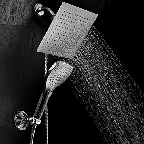 Dual shower heads with water flowing.