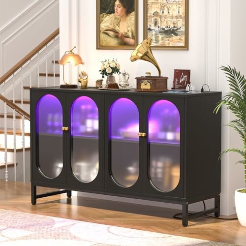 Elegant sideboard with decor items including a vintage gramophone and lamp.