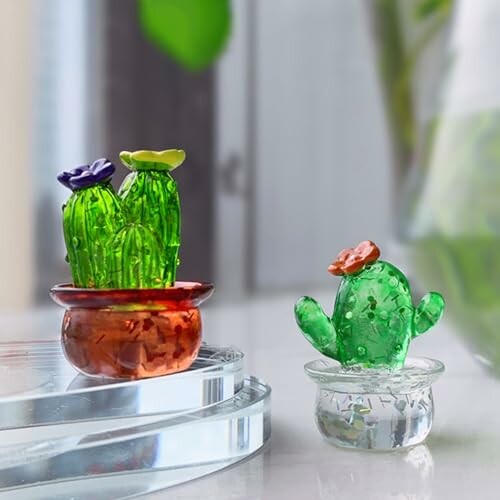 Glass cactus figurines on display