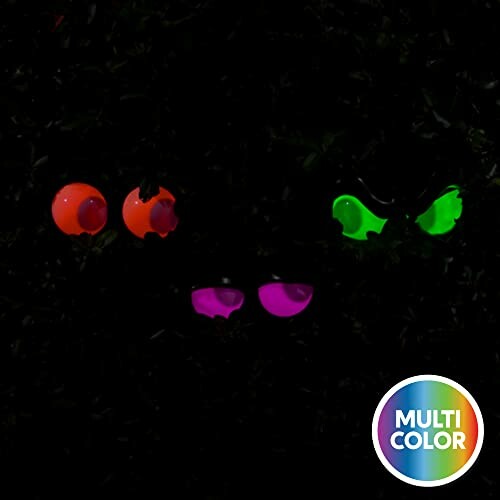 Glowing multicolor Halloween eyes in the dark.