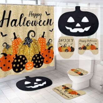 Halloween-themed bathroom decor with pumpkins, bats, and a jack-o'-lantern design.