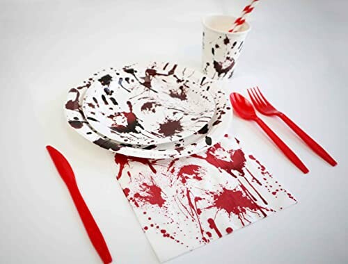 Halloween-themed tableware with red splatter design