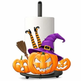 Halloween-themed paper towel holder with pumpkins and witch decorations