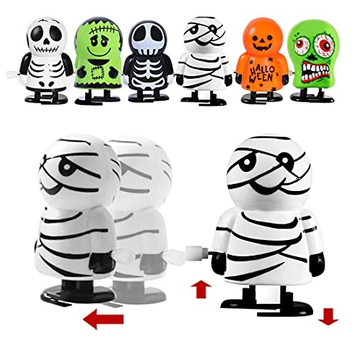 Assorted Halloween wind-up toys including mummies, skeletons, and monsters.