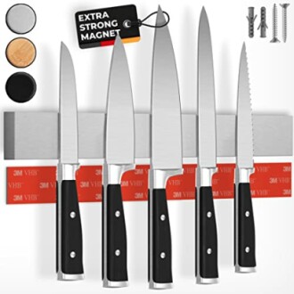 Set of kitchen knives on a magnetic holder with mounting accessories.