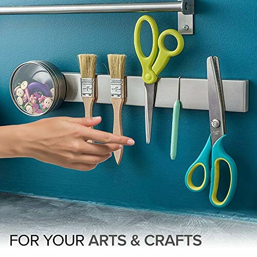 Magnetic tool holder displaying various organized supplies.