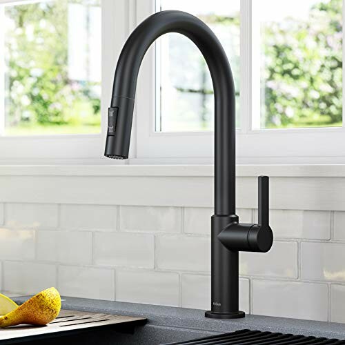 Modern black kitchen faucet with a high arc design.