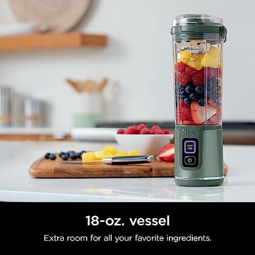 Ninja blender with fruits on a kitchen counter