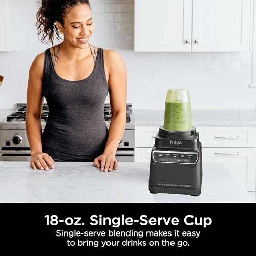 Woman with Ninja blender on kitchen counter