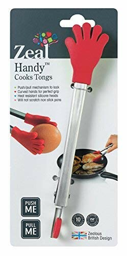 Red hand-shaped cooking tongs on packaging