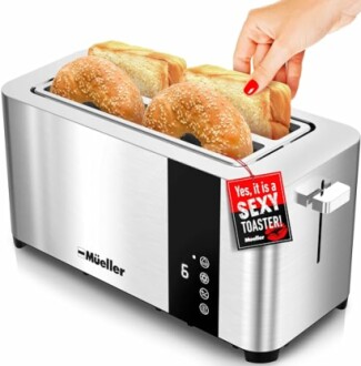 Stainless steel toaster with bagels and bread being toasted.