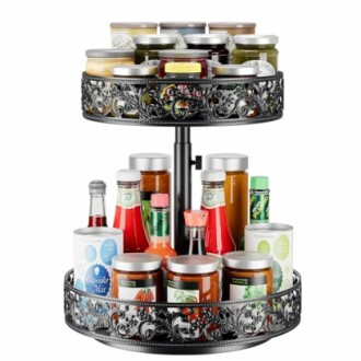 Two-tier spice rack with various jars and bottles.