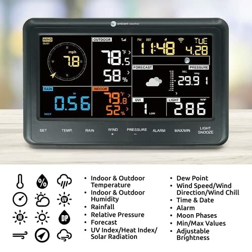 Digital weather station showing indoor and outdoor weather data.