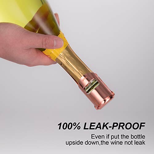 Hand holding a wine bottle upside down with a leak-proof stopper.