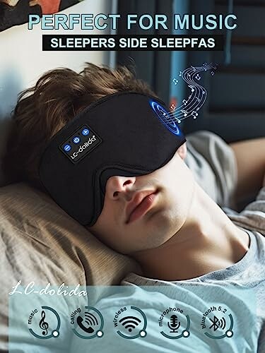 Person wearing wireless sleep mask headphones with music symbols.
