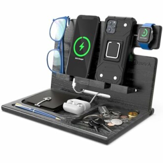 Wooden docking station with smartphone, glasses, watch, and other accessories.