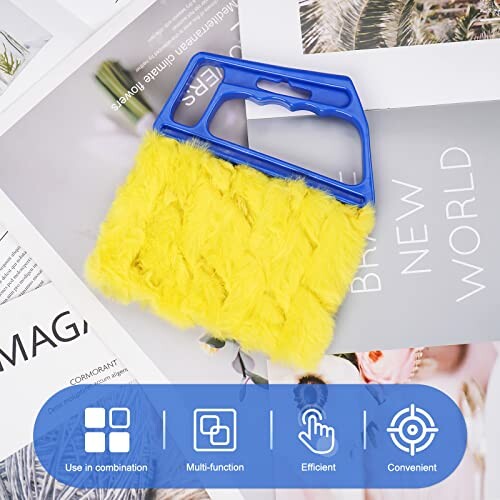 Yellow duster with blue handle on magazines